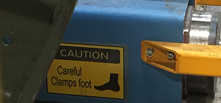 Foot Clamp Warning